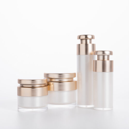 A set of skincare bottles and containers isolated on a white background